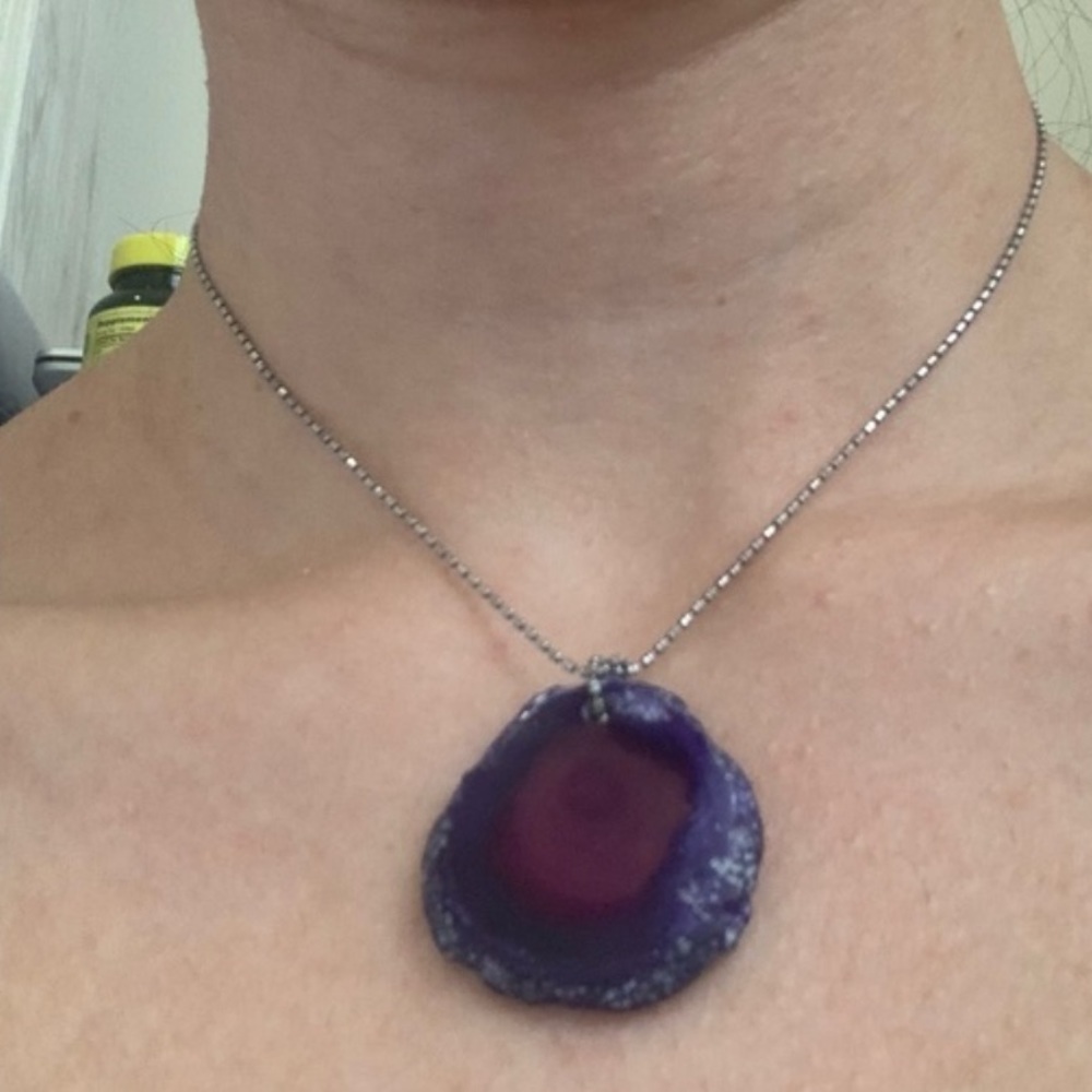 Drilled semi-precious stone new offered with a dust bag
